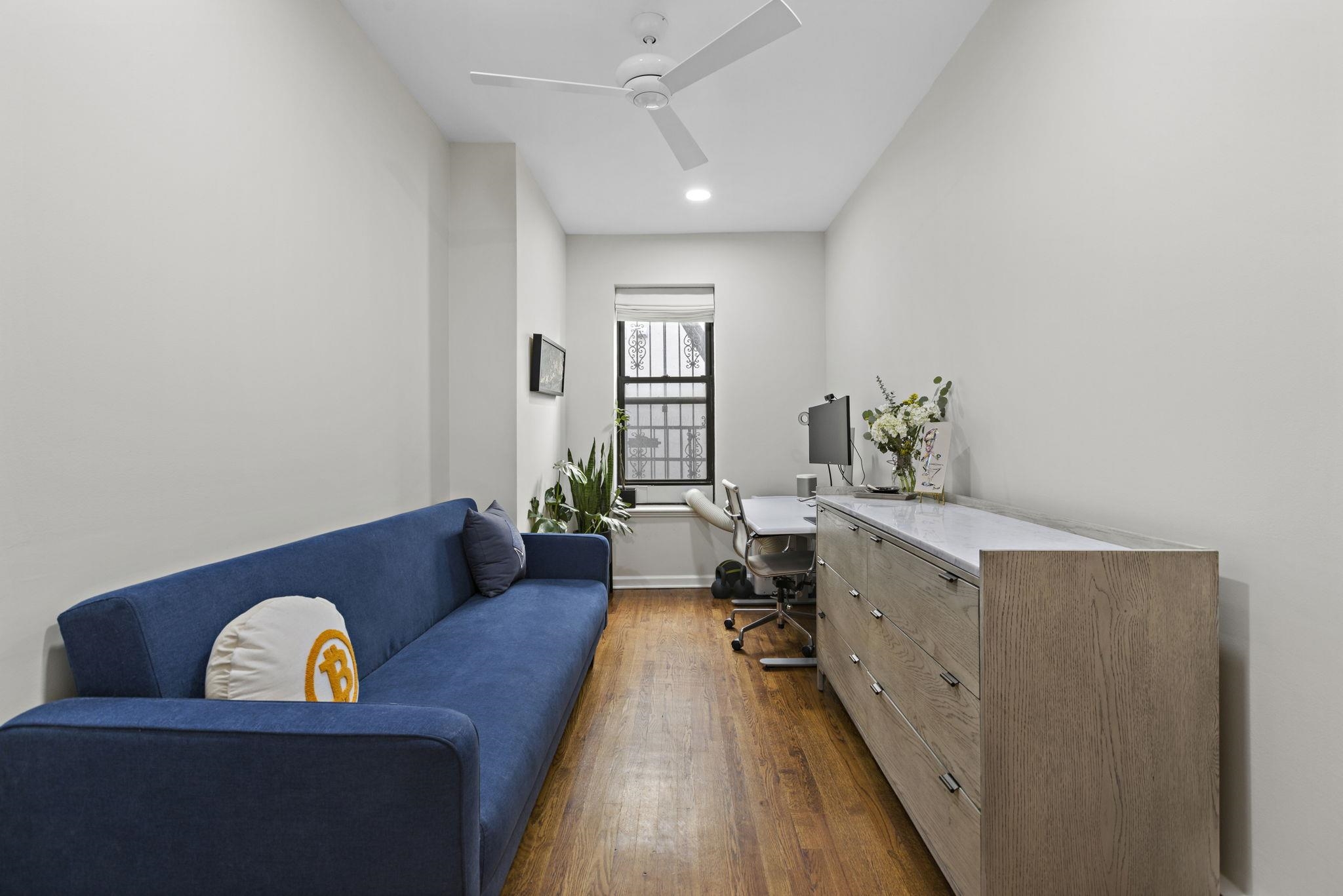 262 1st Street, Unit D Hoboken, NJ 07030 - Photo 14 of 19 a living room with furniture and a couch