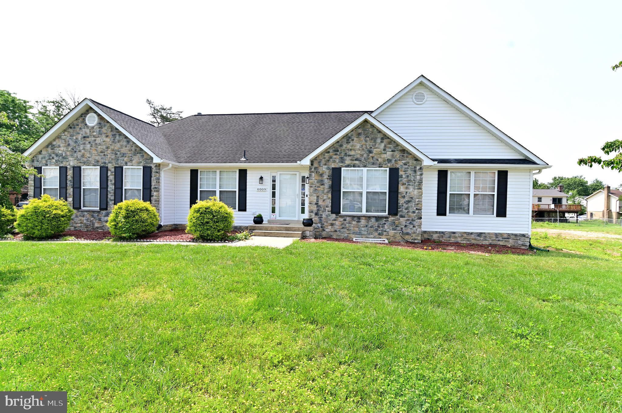 6009 Sellner Lane Clinton, MD 20735 - Photo 1 of 61 a front view of house with yard and green space
