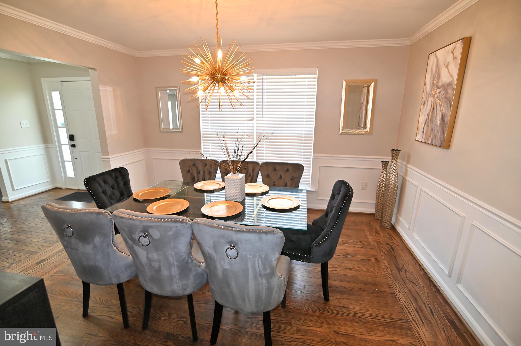 6009 Sellner Lane Clinton, MD 20735 - Photo 13 of 61 a view of a dining room with furniture window and wooden floor