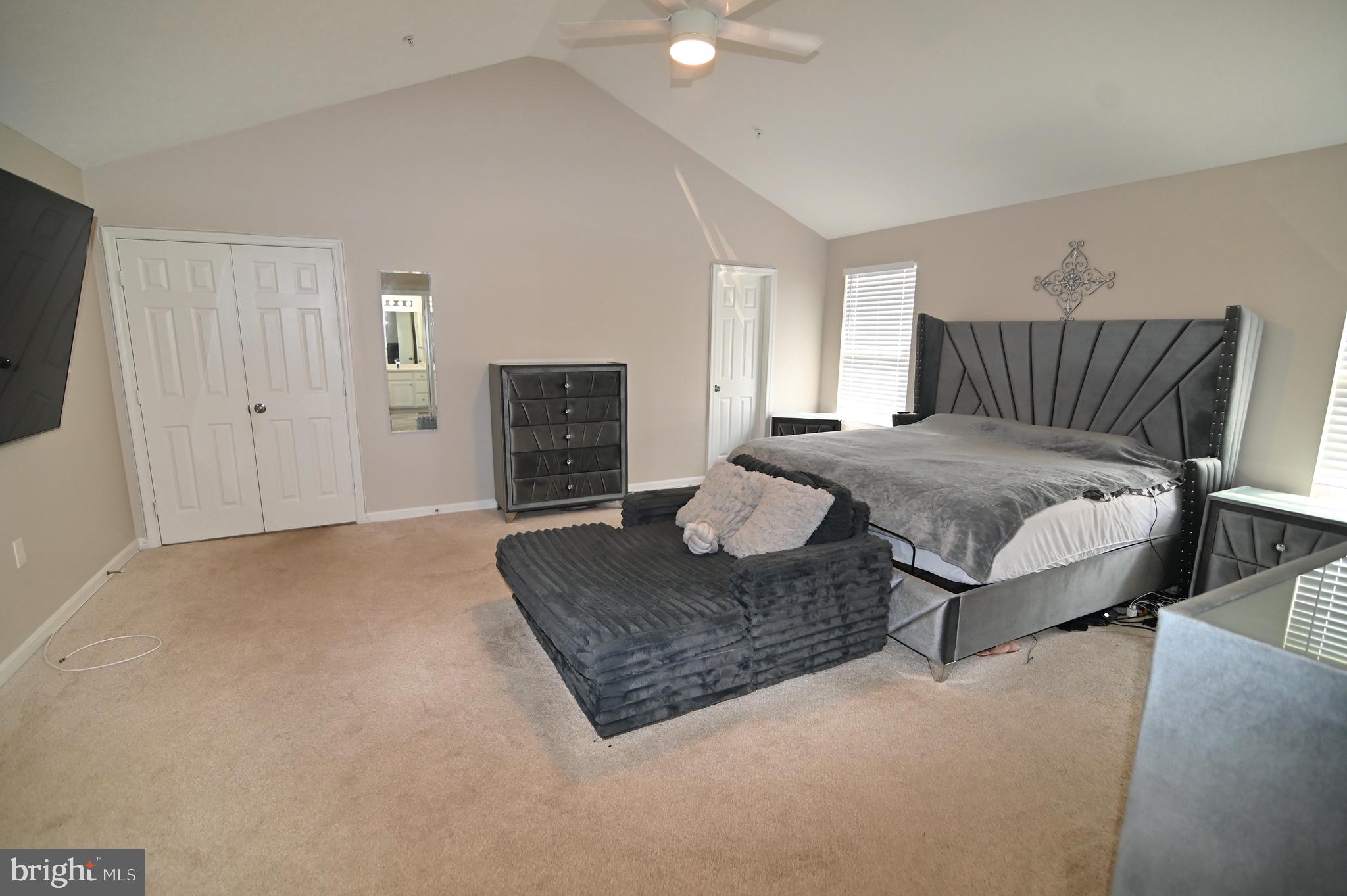 6009 Sellner Lane Clinton, MD 20735 - Photo 30 of 61 a spacious bedroom with a bed and window