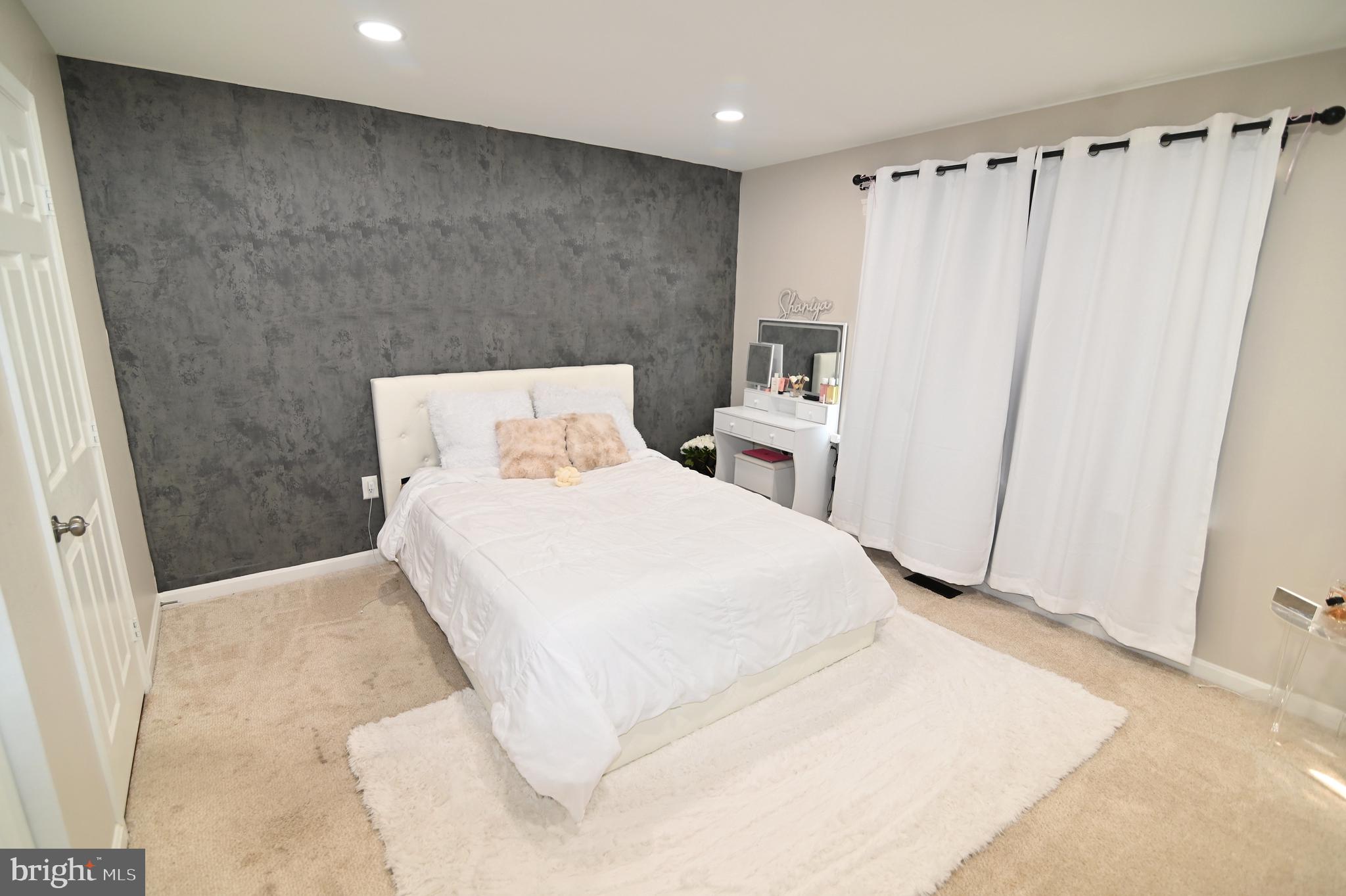 6009 Sellner Lane Clinton, MD 20735 - Photo 35 of 61 a bed room with a bed and a shower