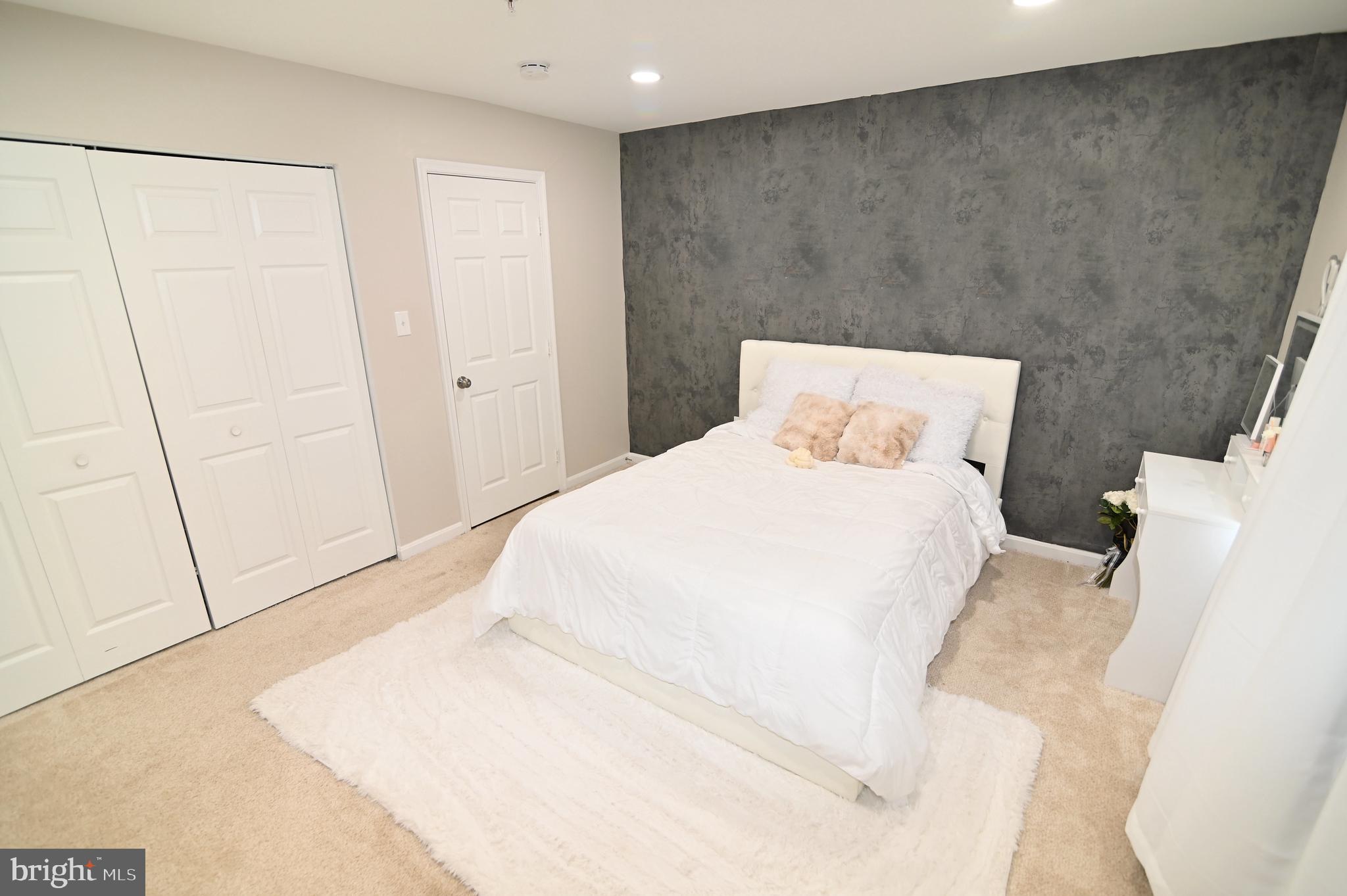 6009 Sellner Lane Clinton, MD 20735 - Photo 36 of 61 a large white bed in a white room