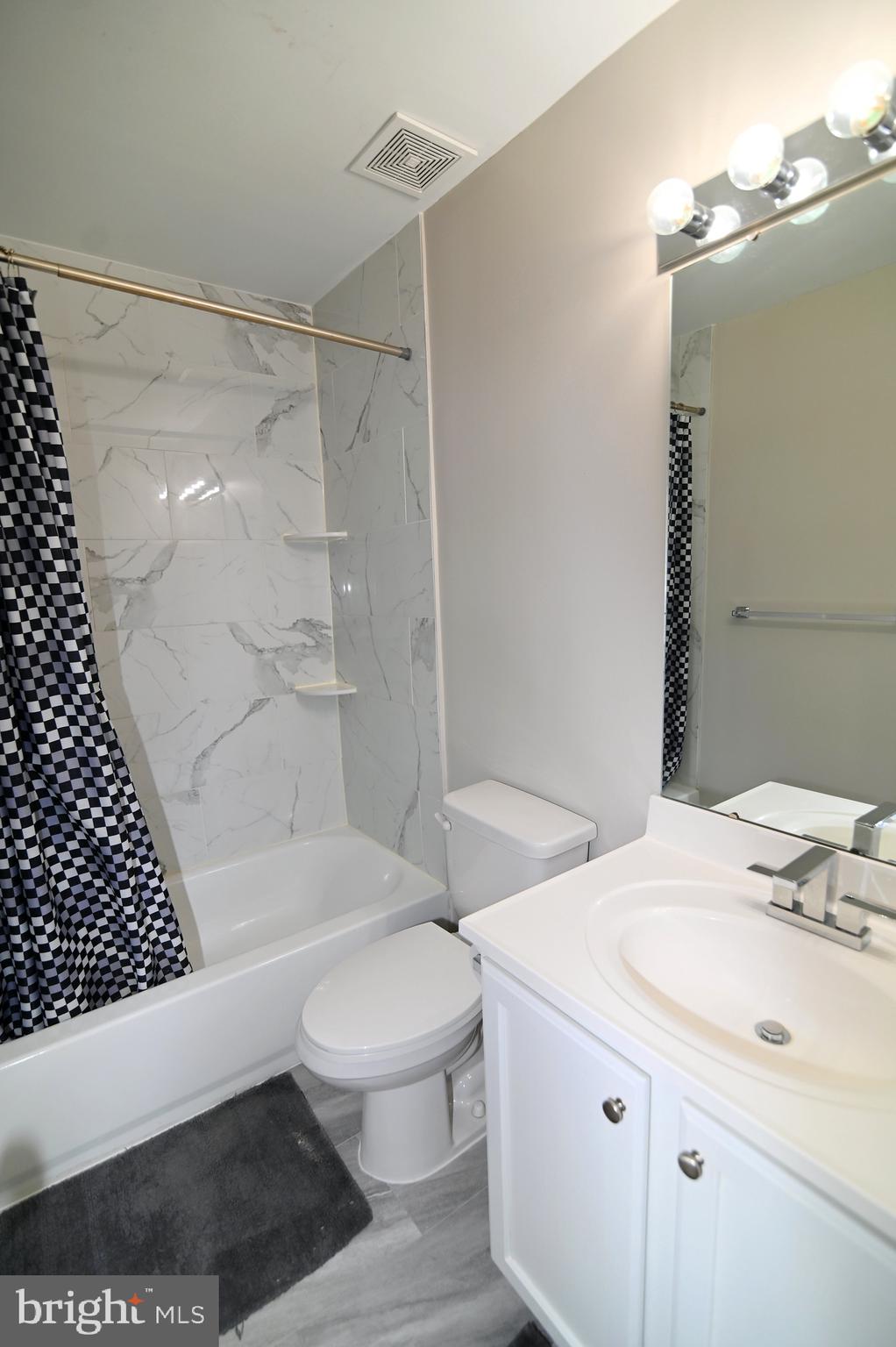 6009 Sellner Lane Clinton, MD 20735 - Photo 41 of 61 a bathroom with a sink toilet and shower