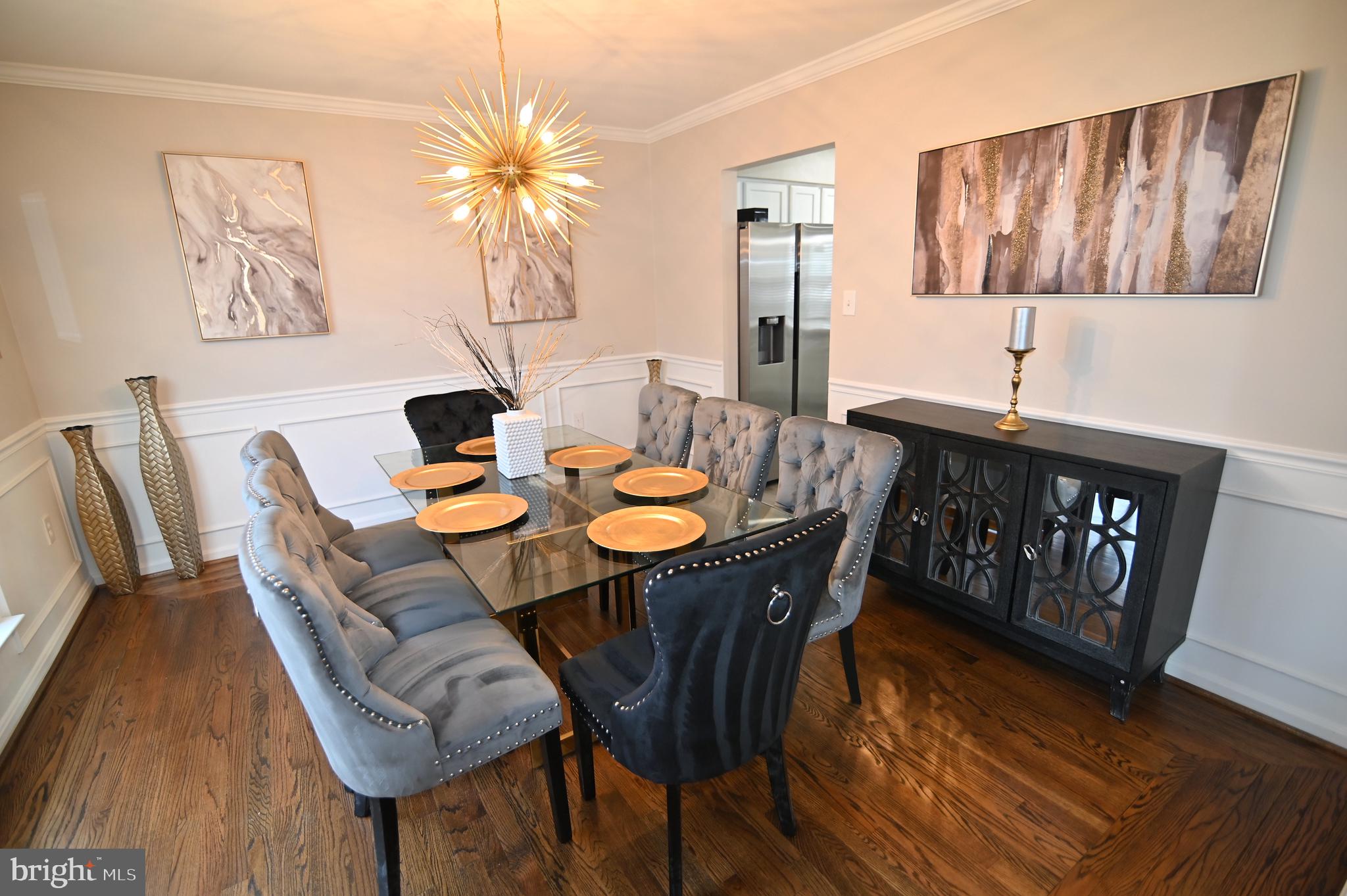 6009 Sellner Lane Clinton, MD 20735 - Photo 10 of 61 a view of a dining room with furniture and wooden floor
