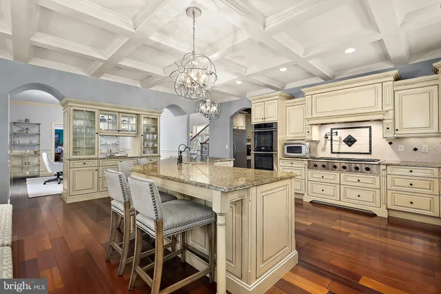 a bathroom with a sink a mirror and shower