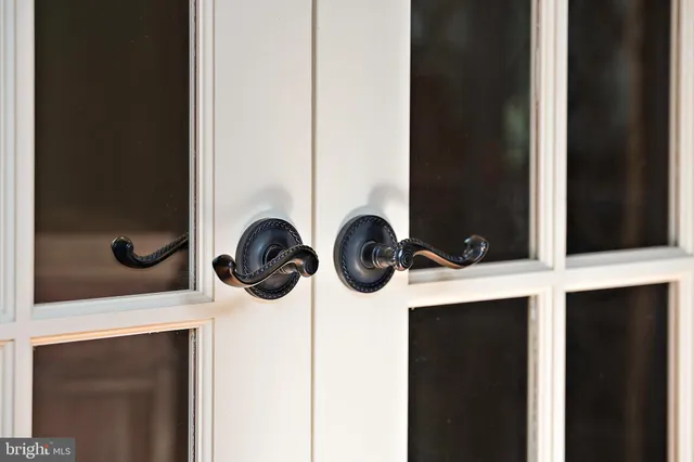 an aerial view of a house with garden space and street view