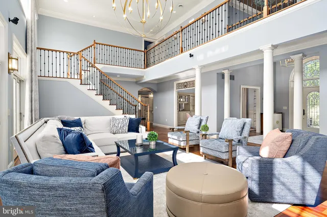 a kitchen with stainless steel appliances a stove a sink and a refrigerator