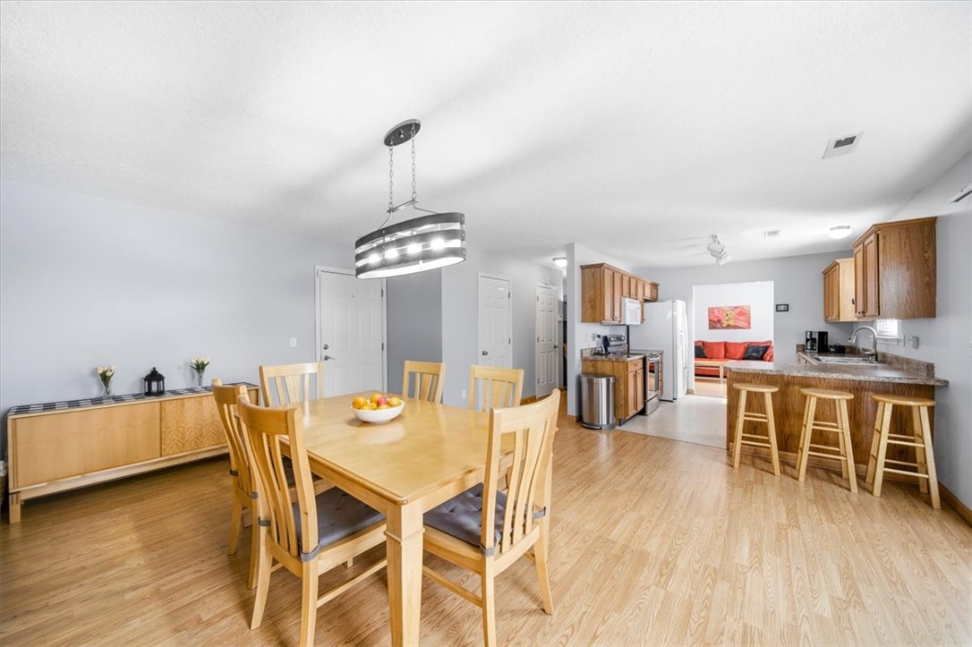 102 Tc-2-168 Pendleton, SC 29670 - Photo 13 of 44 This open concept dining area and kitchen features beautiful flooring.