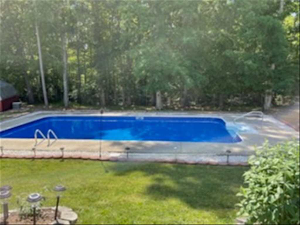 102 Tc-2-168 Pendleton, SC 29670 - Photo 2 of 44 Enjoy outdoor living with this expansive private pool, perfect for relaxation and entertaining.