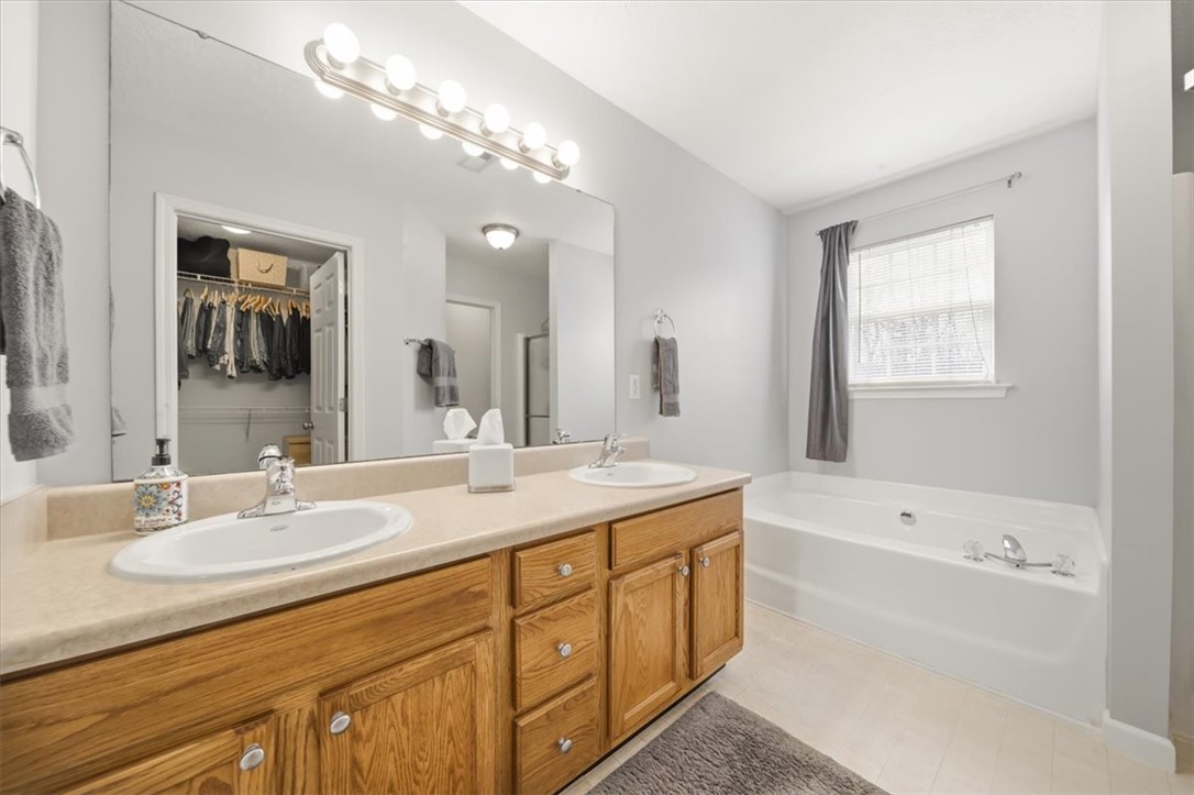 102 Tc-2-168 Pendleton, SC 29670 - Photo 26 of 44 This spacious bathroom offers dual sinks and a relaxing soaking tub.