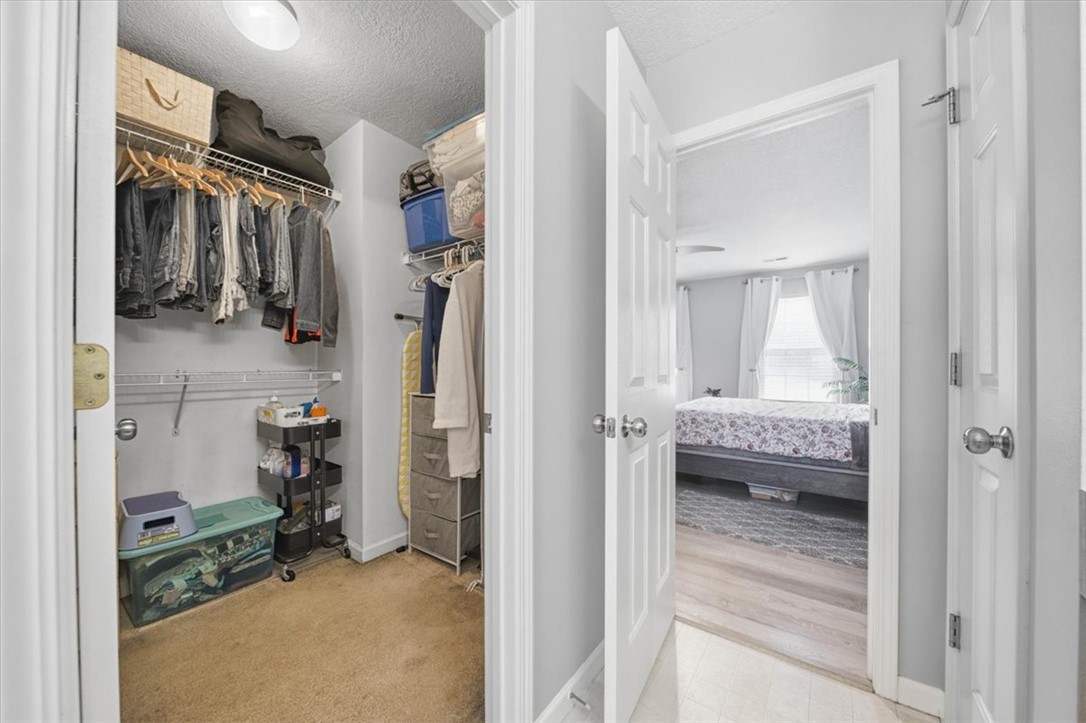102 Tc-2-168 Pendleton, SC 29670 - Photo 28 of 44 This spacious walk-in closet offers ample storage adjacent to a serene bedroom.