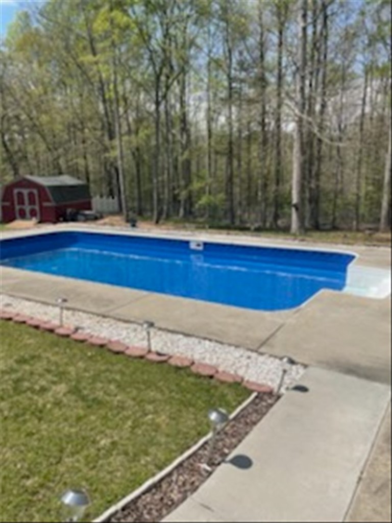102 Tc-2-168 Pendleton, SC 29670 - Photo 39 of 44 Enjoy outdoor living with a private pool and spacious yard, perfect for recreation and relaxation.