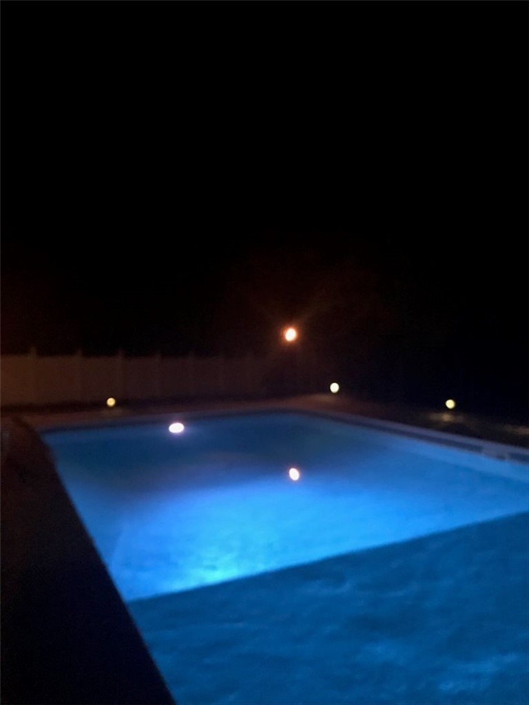 102 Tc-2-168 Pendleton, SC 29670 - Photo 40 of 44 An inviting private pool glows under the night sky, perfect for evening relaxation.