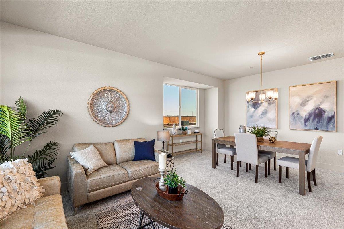 2970 East Tuolumne Road Turlock, CA 95382 - Photo 13 of 68 a living room with furniture potted plant and white walls