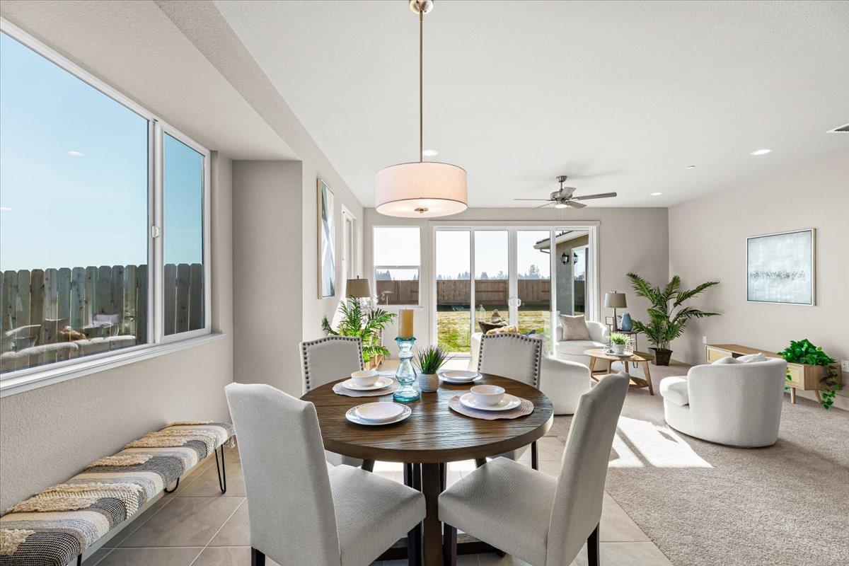 2970 East Tuolumne Road Turlock, CA 95382 - Photo 28 of 68 a view of a dining room with furniture window and outside view