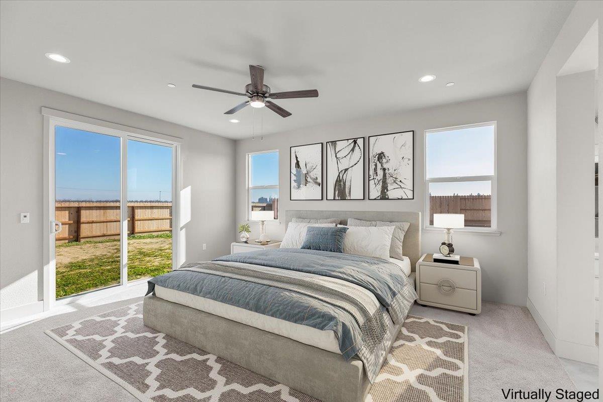 2970 East Tuolumne Road Turlock, CA 95382 - Photo 55 of 68 a bedroom with a large bed and a window