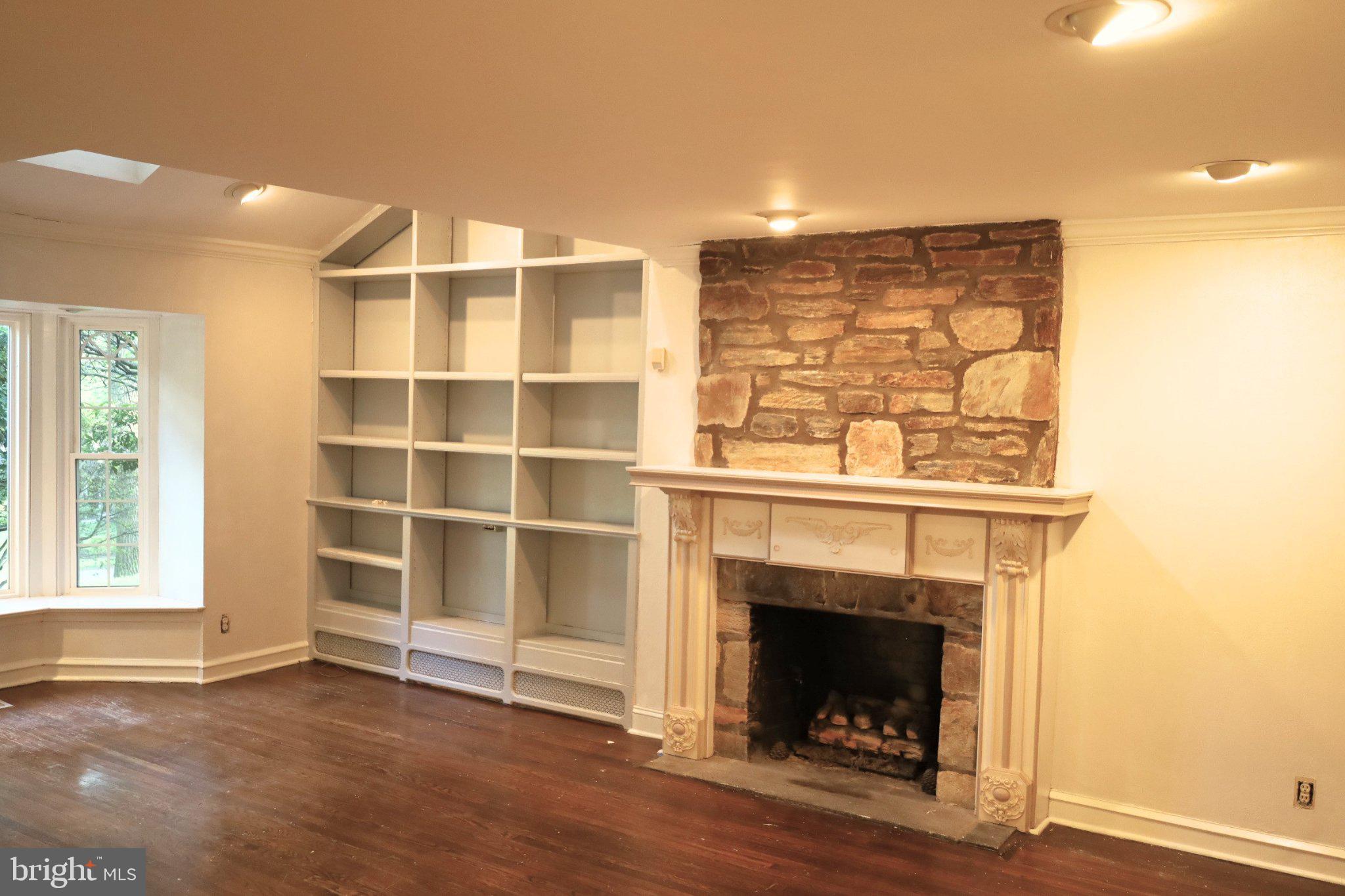 1268 Rydal Road Jenkintown, PA 19046 - Photo 1 of 1 Charming space with a rustic fireplace.
