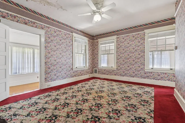 an empty room with windows