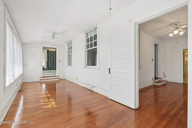 an aerial view of a city with lots of residential buildings