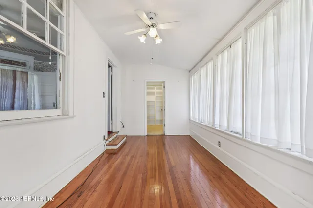 an aerial view of a swimming pool and mountain view