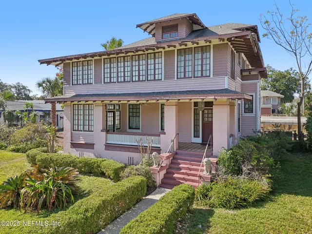 a view of a balcony with a floor to ceiling window