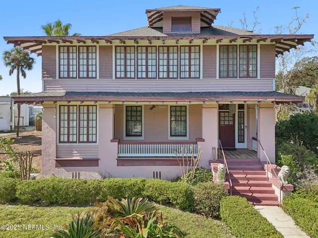 a view of a cars parked in front of a building