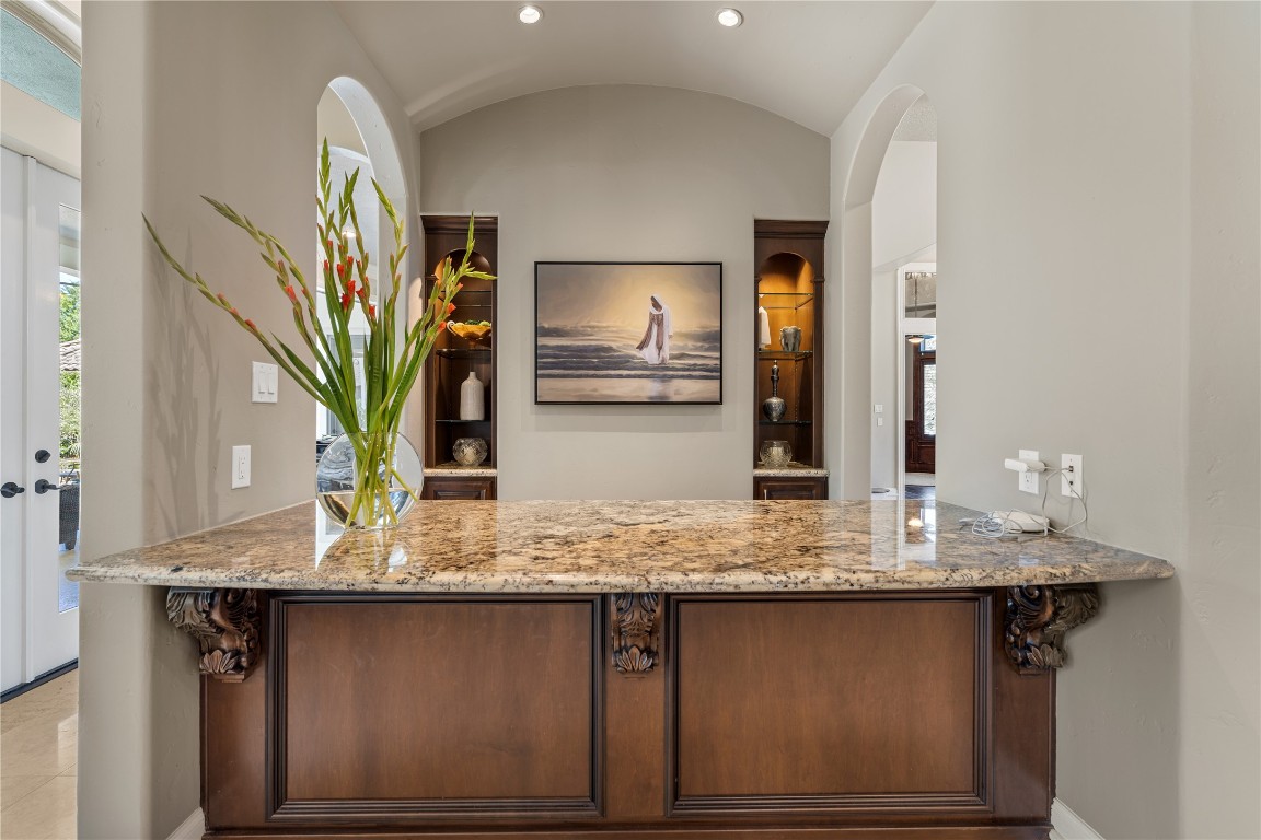 82 Manor Lake Estates Circle Spring, TX 77379 - Photo 21 of 50 a bathroom with a granite countertop sink and a mirror