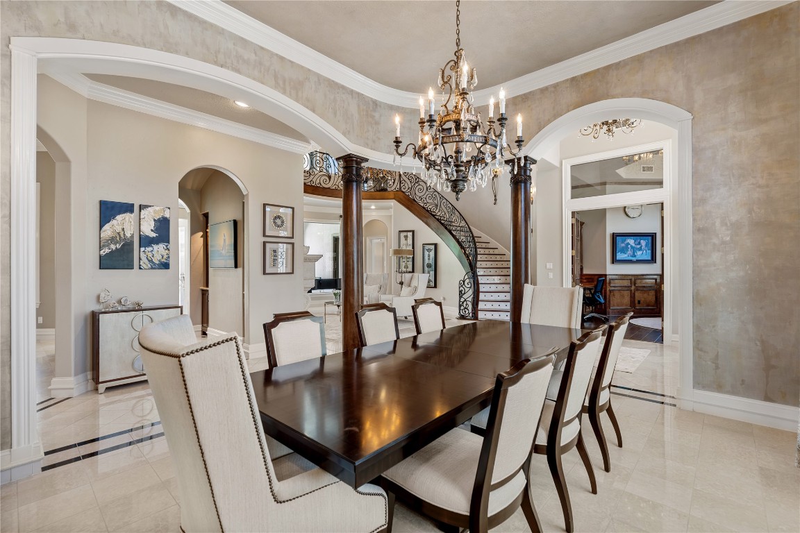 82 Manor Lake Estates Circle Spring, TX 77379 - Photo 10 of 50 a view of a dining room with furniture and chandelier