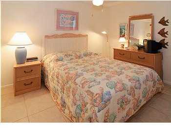 3799 Hwy Santa Rosa Beach, Unit 5D 30A Santa Rosa Beach, FL 32459 - Photo 3 of 9 a bedroom with a bed and furniture