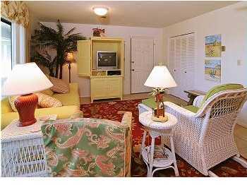3799 Hwy Santa Rosa Beach, Unit 5D 30A Santa Rosa Beach, FL 32459 - Photo 6 of 9 a living room with furniture and a table