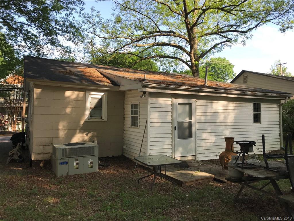 536 Watson Street Davidson, NC 28036 - Photo 2 of 3 a view of a small house with yard and furniture