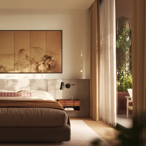 a bedroom with a bed and a painting on the wall