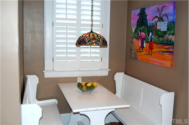 118 Hudson Street Raleigh, NC 27608 - Photo 7 of 12 What could be better!!...a cozy alcove in the kitchen for breakfast or candlelight dinners! The table and benches to remain.