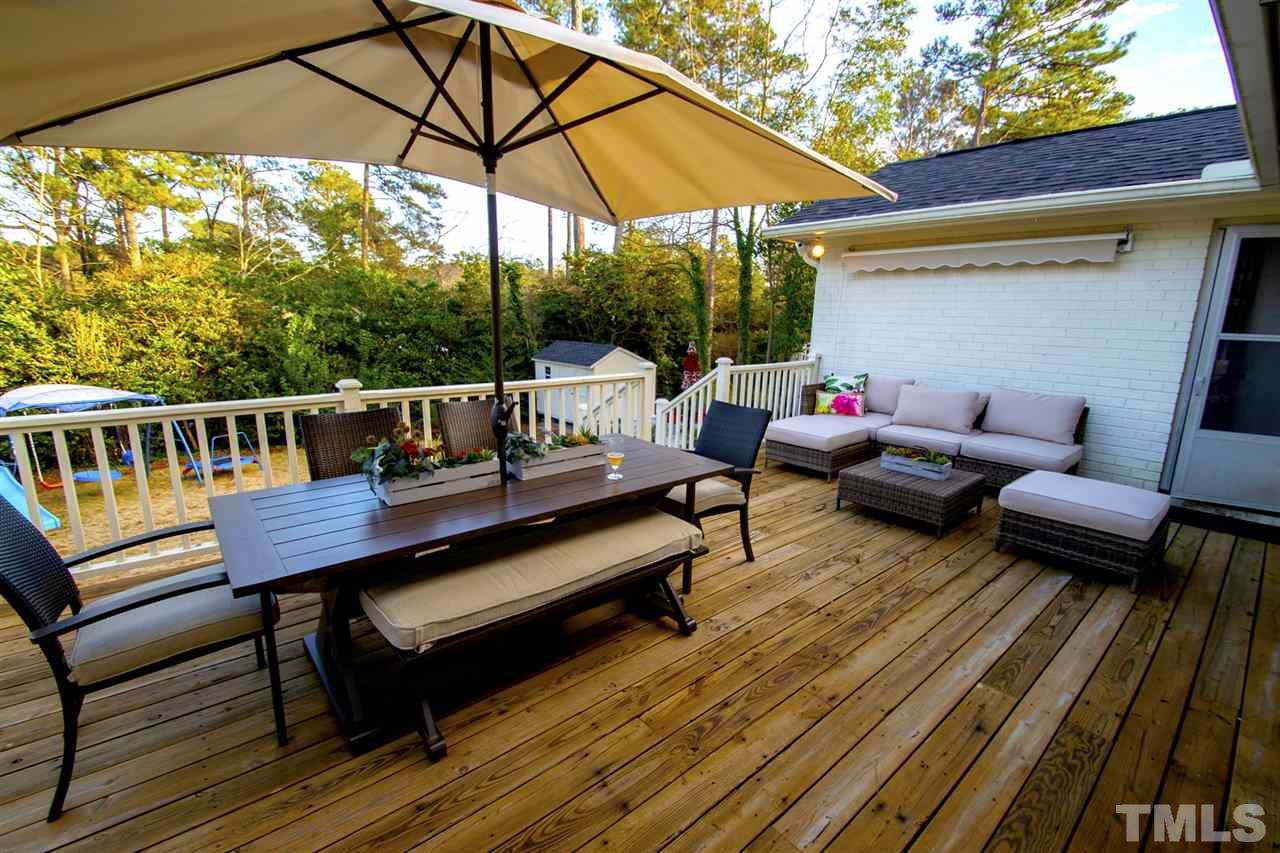 2324 Ridge Road Raleigh, NC 27612 - Photo 22 of 25 a view of a outdoor sitting area with furniture
