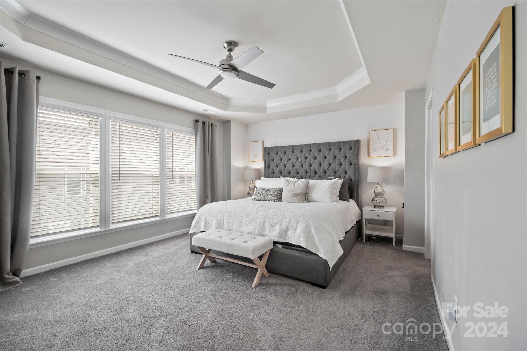 829 Canoe Song Road Fort Mill, SC 29708 - Photo 17 of 38 a bed room with a bed and a large window