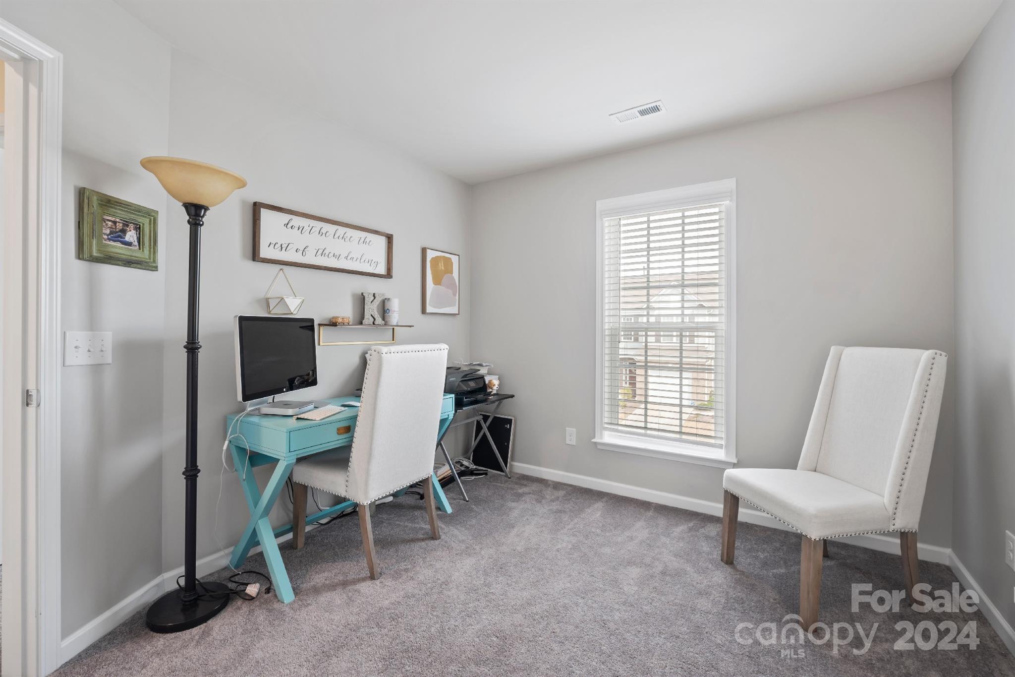 829 Canoe Song Road Fort Mill, SC 29708 - Photo 25 of 38 a living room with furniture a window and a table