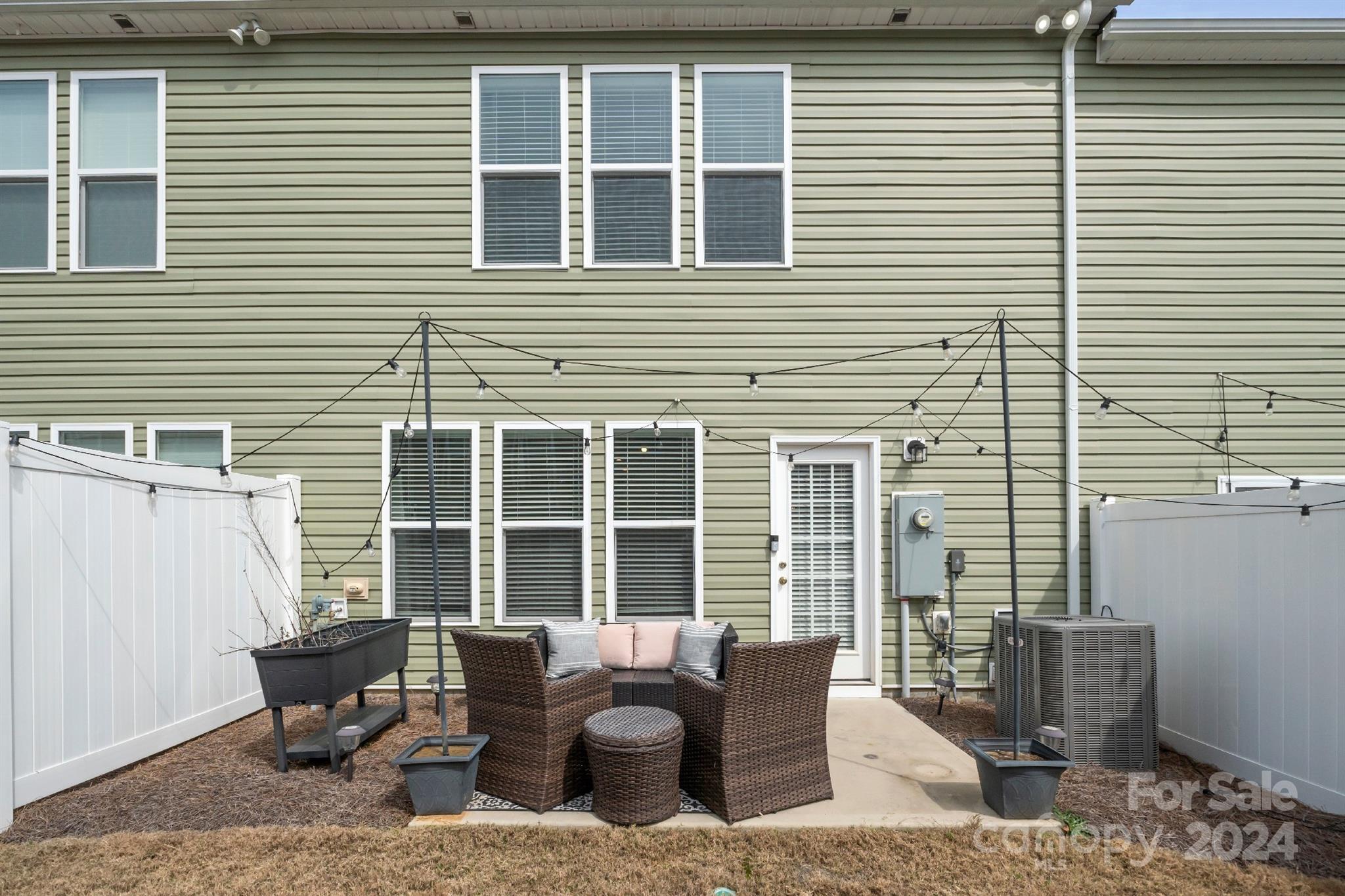 829 Canoe Song Road Fort Mill, SC 29708 - Photo 34 of 38 a balcony with furniture and outdoor seating