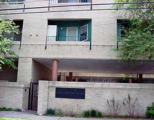 2308 Rio Grande Street, Unit 201 Austin, TX 78705 - Photo 1 of 1 a front view of a house with garage