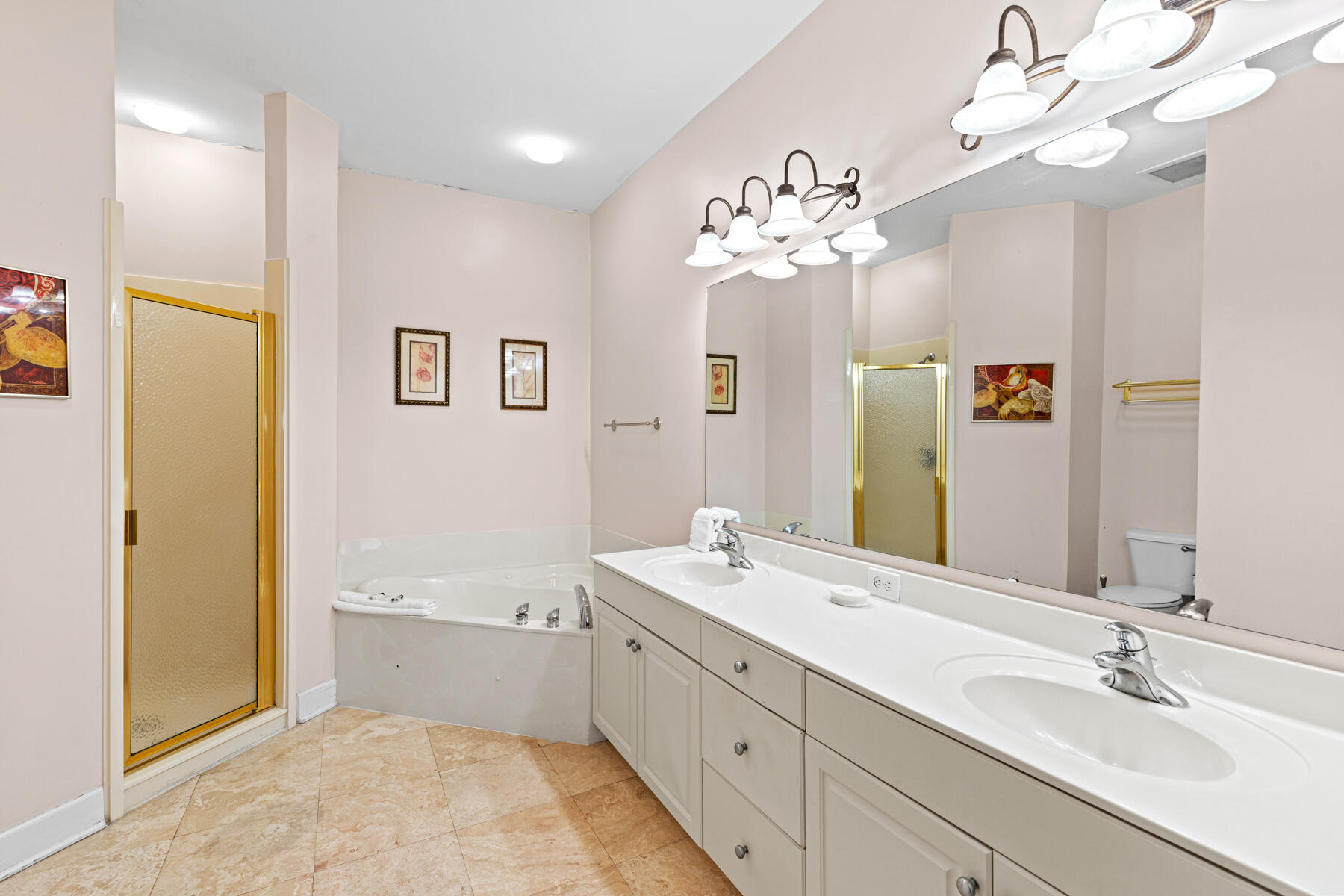 10343 East County Highway 30A, Unit 312D Inlet Beach, FL 32413 - Photo 12 of 19 a spacious bathroom with a double vanity sink a mirror and a bathtub