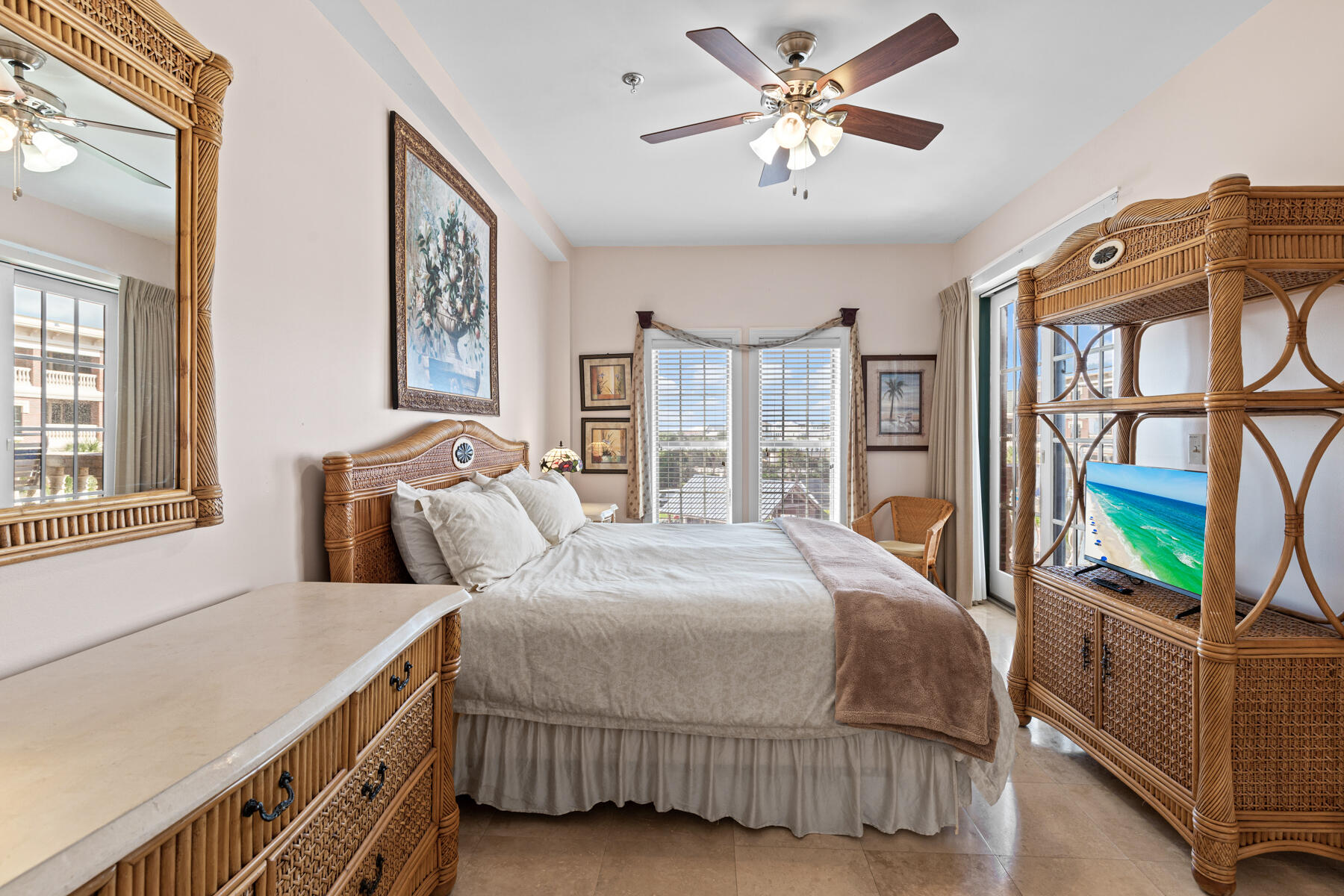 10343 East County Highway 30A, Unit 312D Inlet Beach, FL 32413 - Photo 10 of 19 a bedroom with a large bed and a chandelier