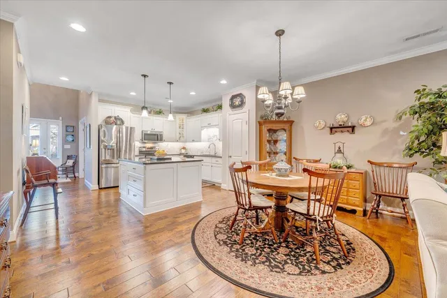 a living room with furniture fireplace and window