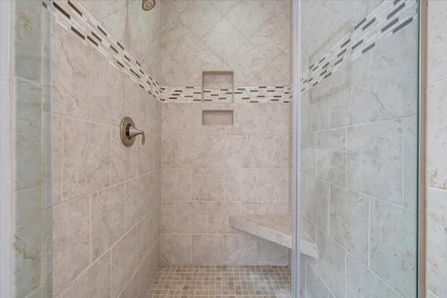 a bathroom with a sink toilet and mirror