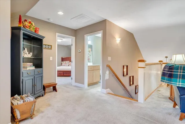 a bedroom with a large bed and a large window