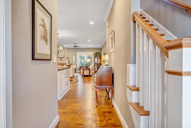 a view of entryway livingroom and hall with wooden floor