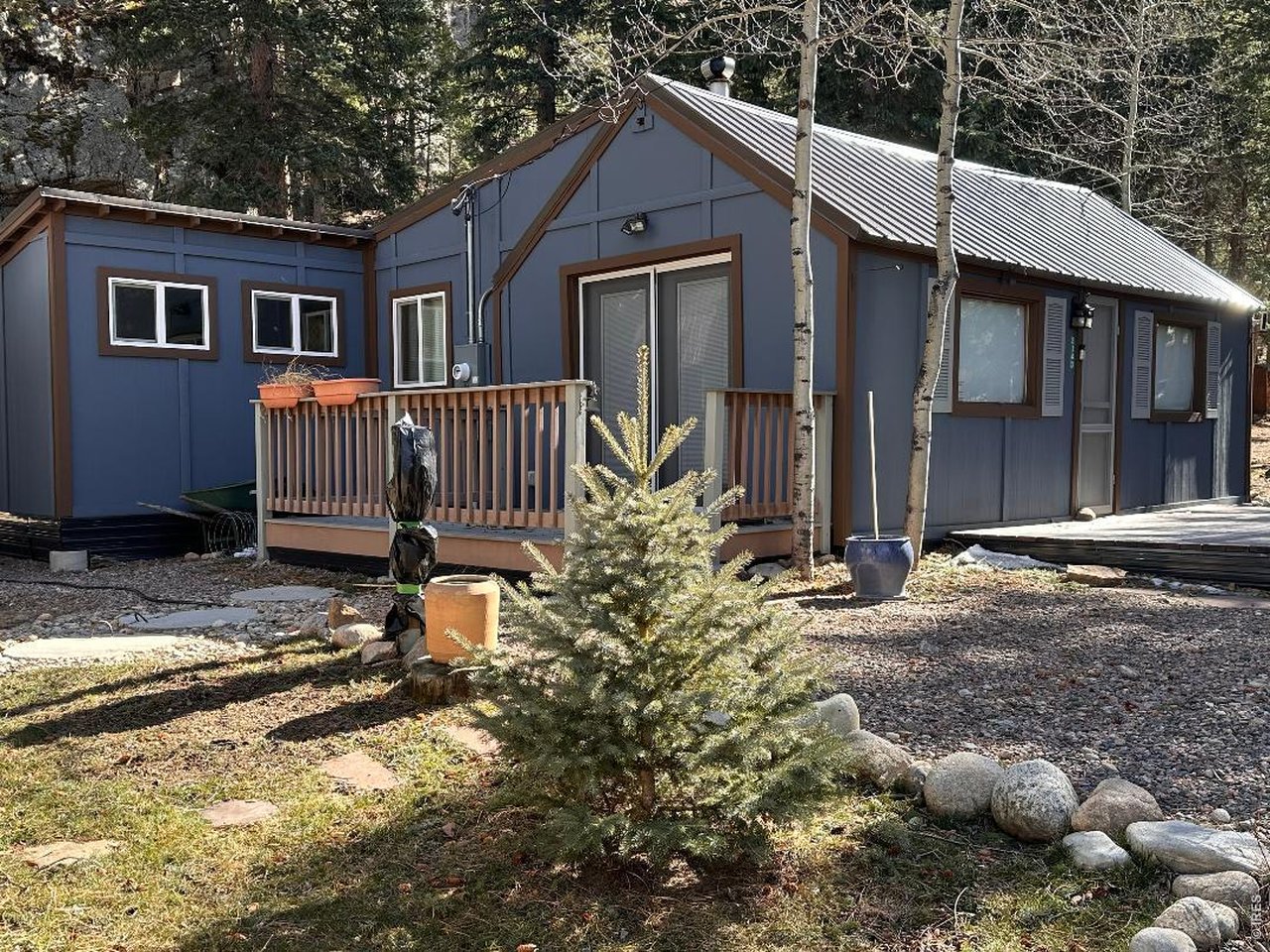 3143 Riverside Drive Lyons, CO 80540 - Photo 2 of 20 Cabin in early Spring