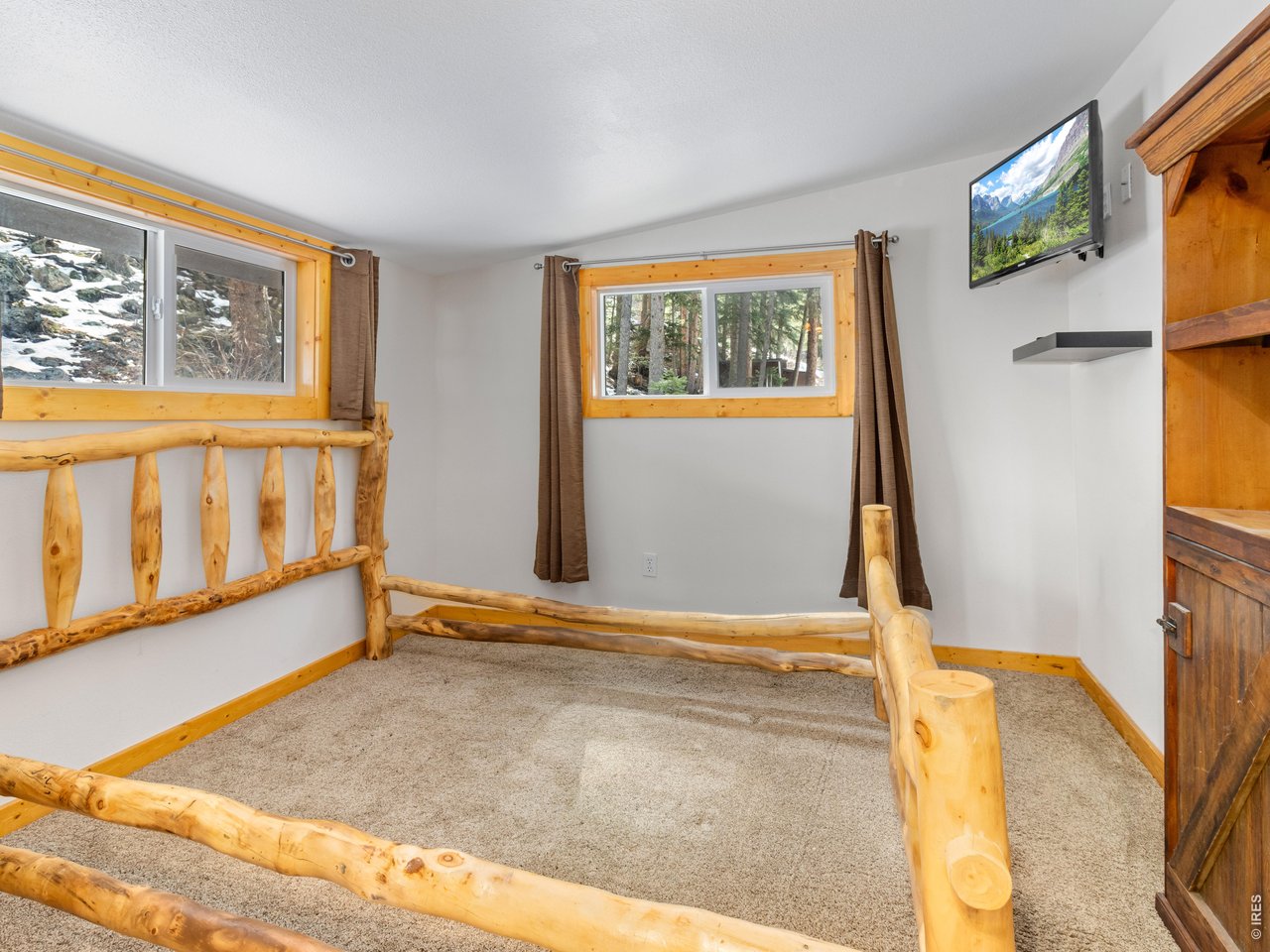 3143 Riverside Drive Lyons, CO 80540 - Photo 10 of 24 a view of an empty room with a window