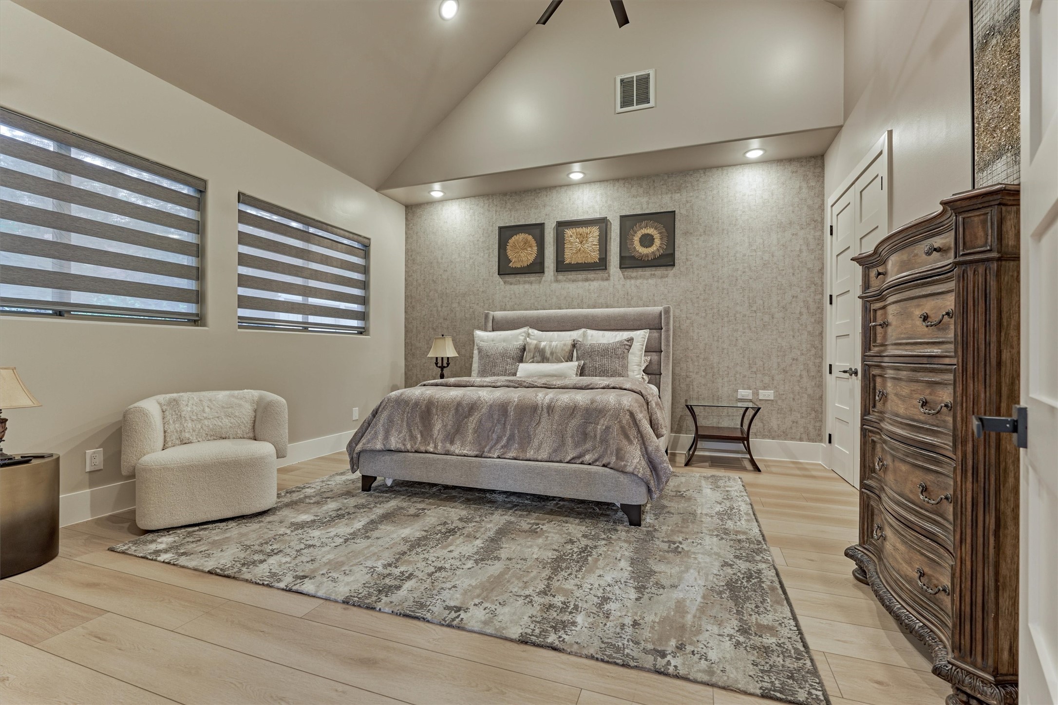 1907 Woerner Road Houston, TX 77090 - Photo 29 of 50 A second spacious bedroom in guest's quarters with recess lighting and double door walk-in closet. All shades on windows are remote controlled.