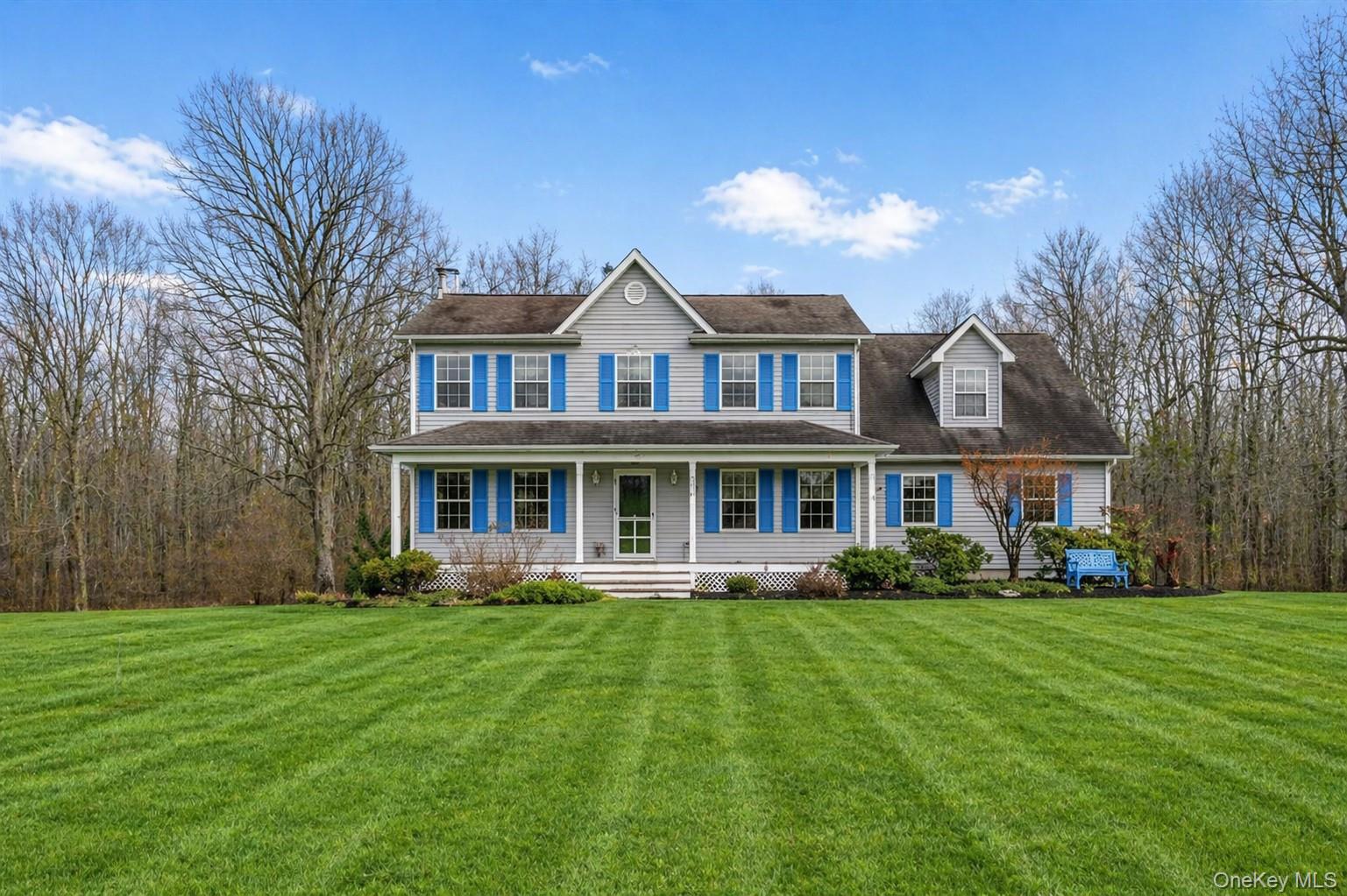 89 James Wilkinson Road Rock Tavern, NY 12575 - Photo 1 of 11 a front view of house with yard and green space