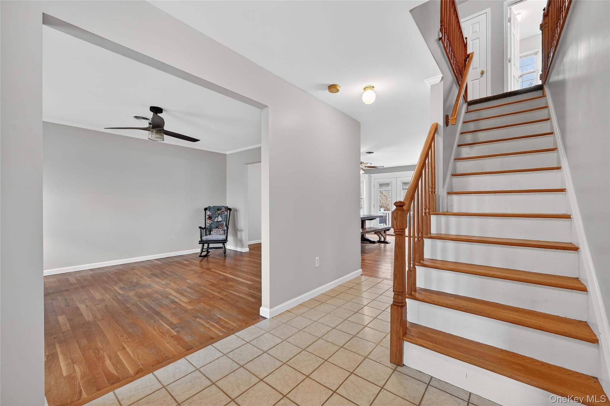89 James Wilkinson Road Rock Tavern, NY 12575 - Photo 3 of 11 a view of a livingroom with wooden floor and stairs