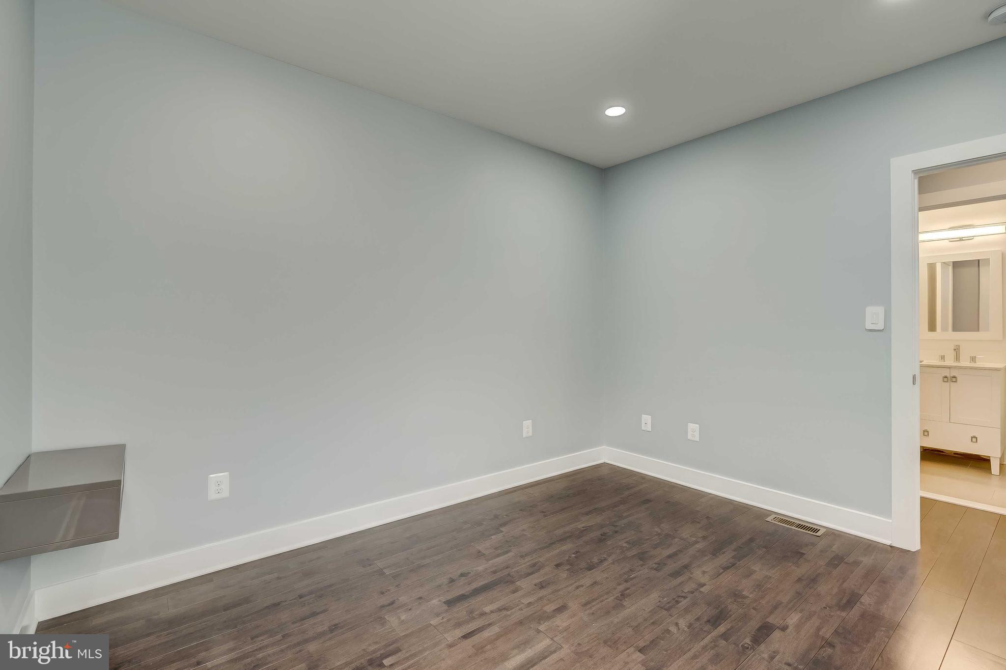 1605 F Street Northeast, Unit 2 Washington, DC 20002 - Photo 15 of 29 a view of empty room with wooden floor